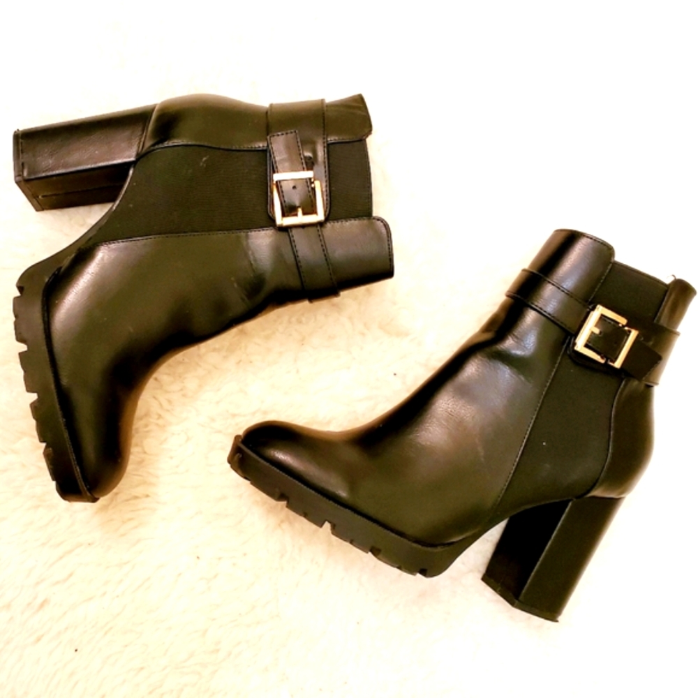 Black leather heeled boots